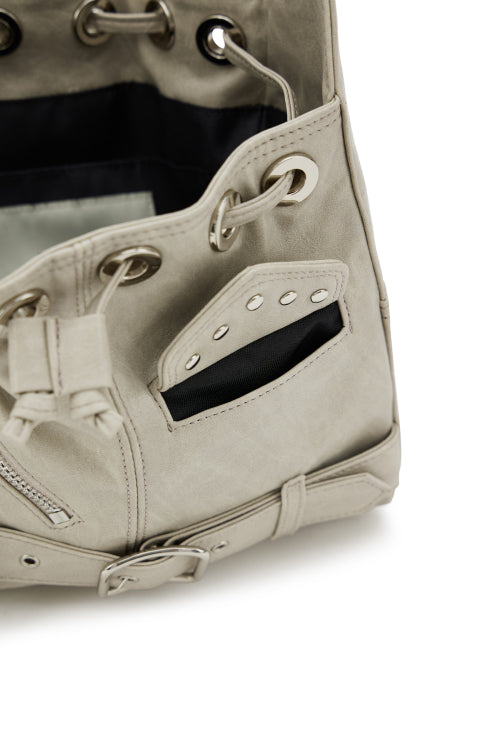 DEINET STUD BELTED MINI BUCKET BAG IN ASH BEIGE