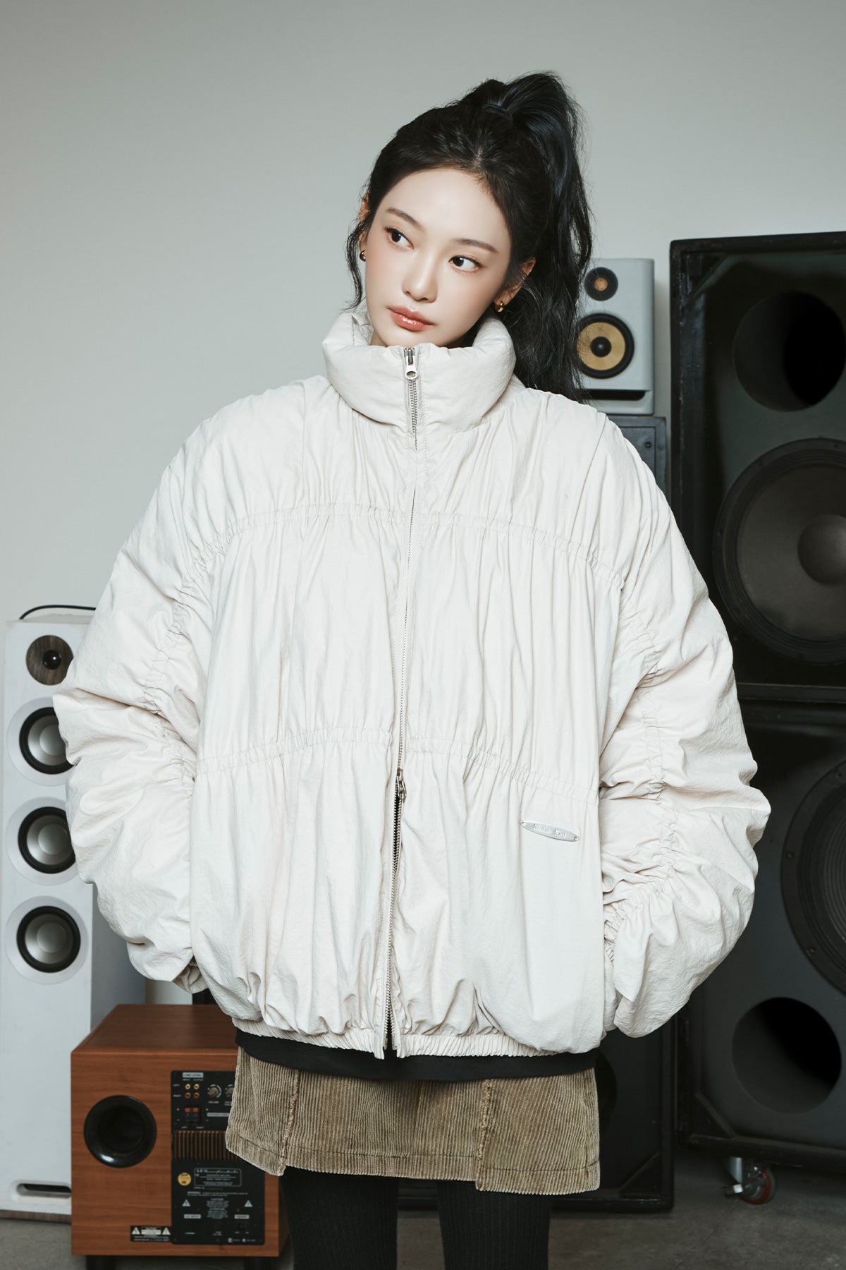 HIGH NECK SHIRRING DOWN JUMPER IN LIGHT BEIGE