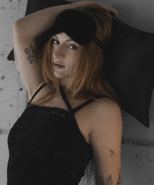 Fuzzy cross sleeveless in black