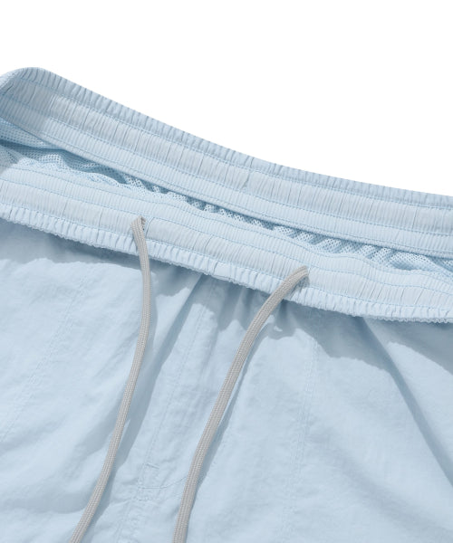 Windbreaker shorts light blue