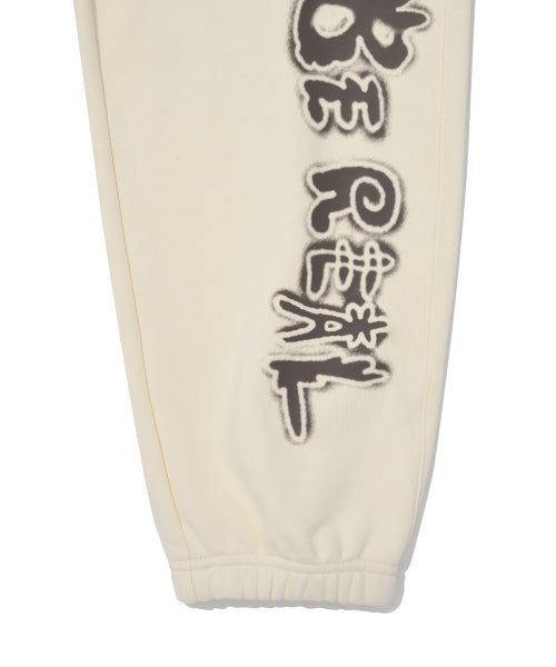 Spray graphic sweatpants cream