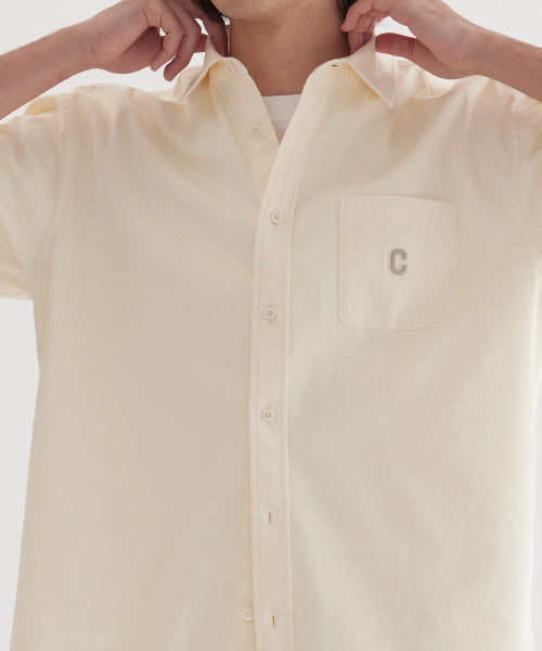 C LOGO PIGMENT OXFORD HALF SHIRTS