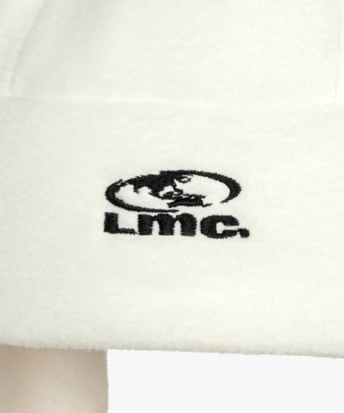 OVAL GLOBE FLEECE EARFLAP BEANIE ivory