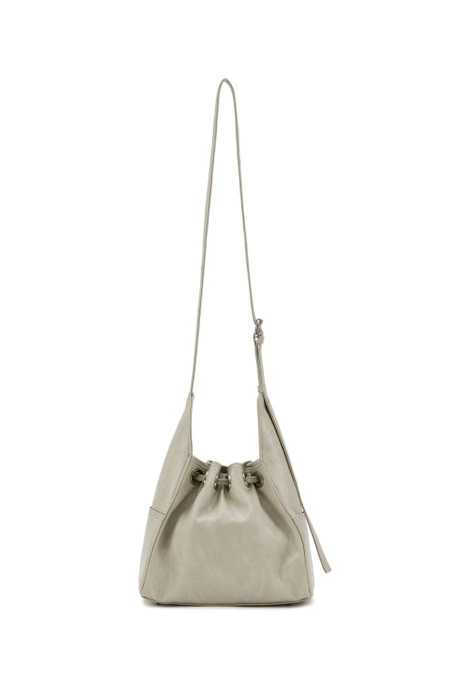 DEINET STUD BELTED MINI BUCKET BAG IN ASH BEIGE
